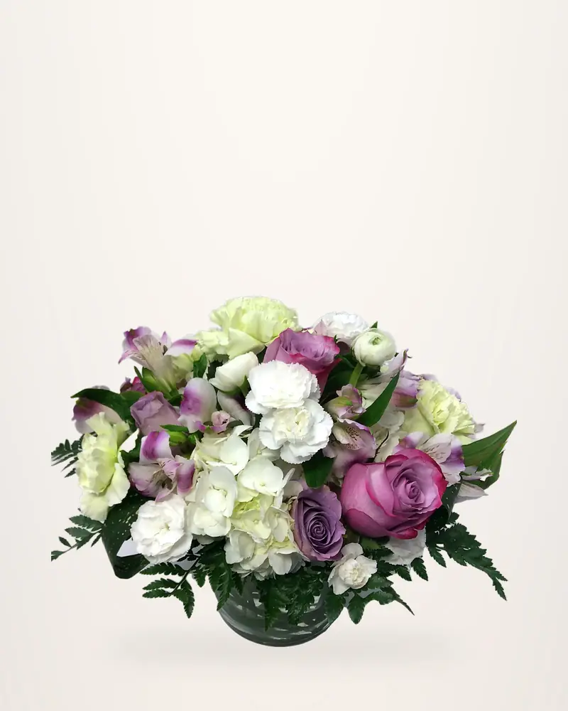 Soft white and lavender rose arrangement, a good size for a hospital room